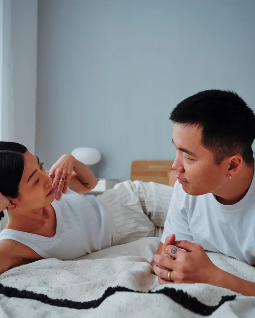 Couple Talking in Bed