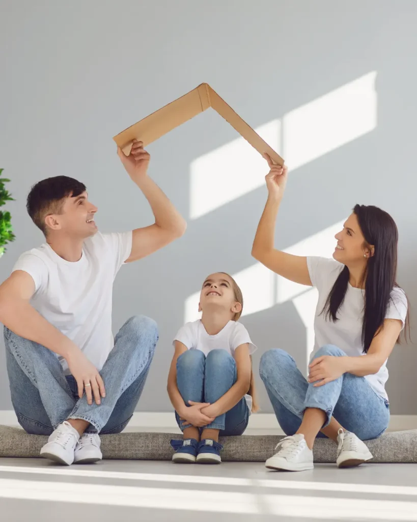 Happy Family with Children Moving in a New Apartment House.Mother Father and Baby Daughter in a New House.