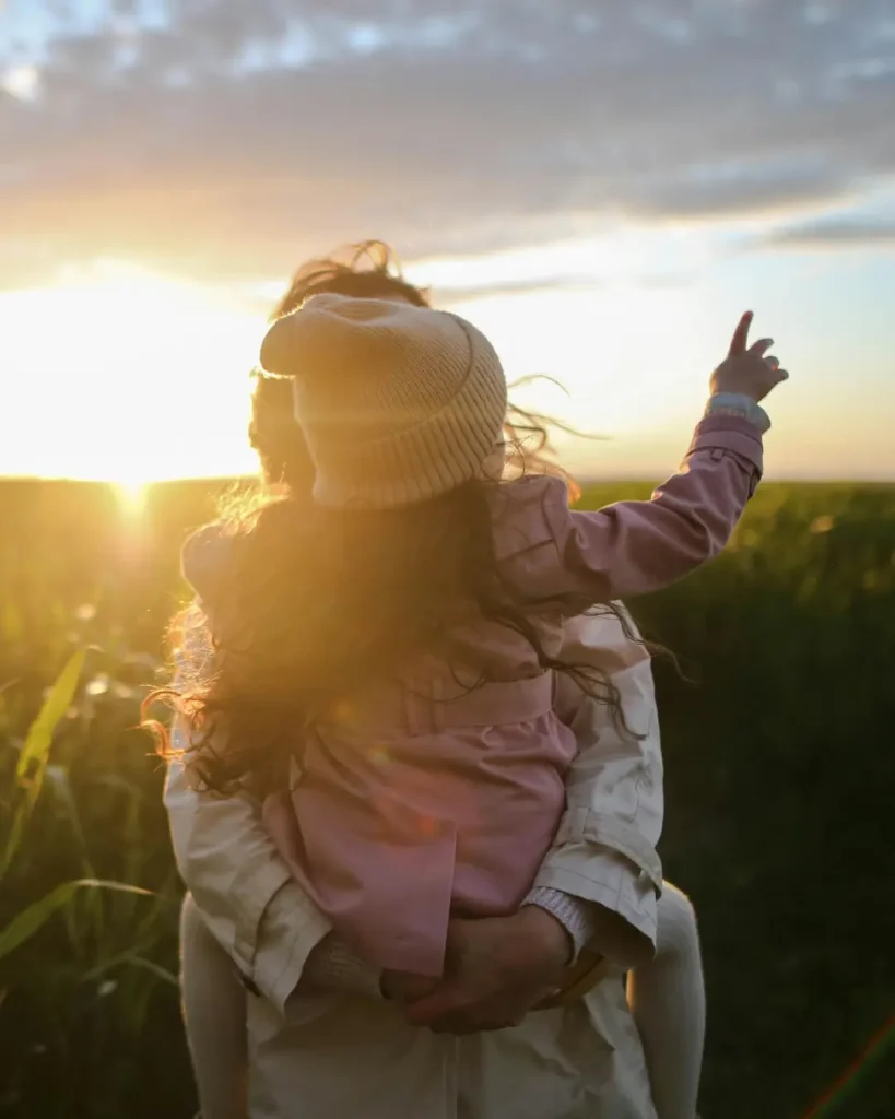 Mother and Daughter on Grass