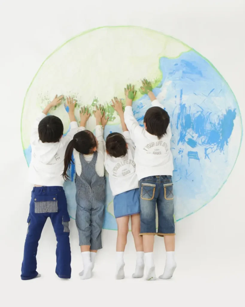 Children Painting a Colorful Earth Mural