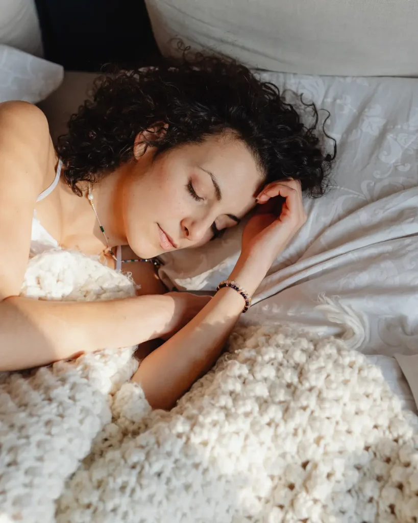 A Woman Sleeping on the Bed