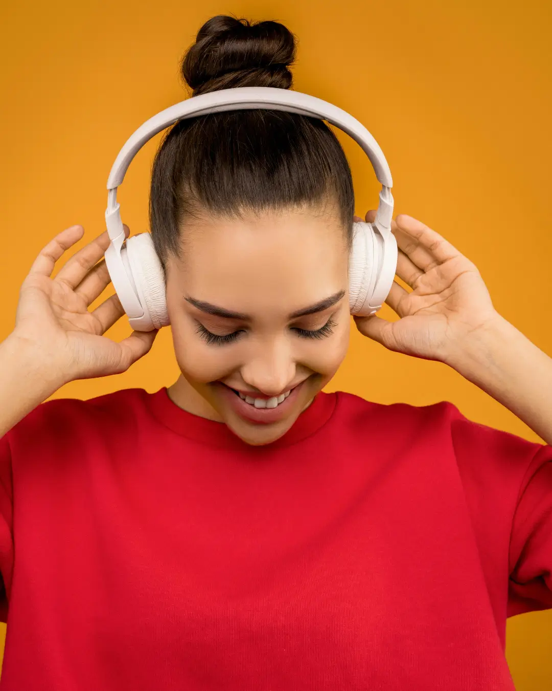 Photo of Woman Using White Headphones