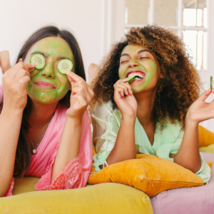 young women using green face masks. Saturday self care ideas
