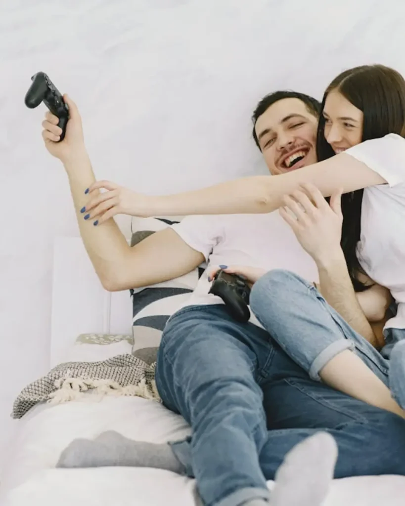 Photo of Man and Woman Having Fun