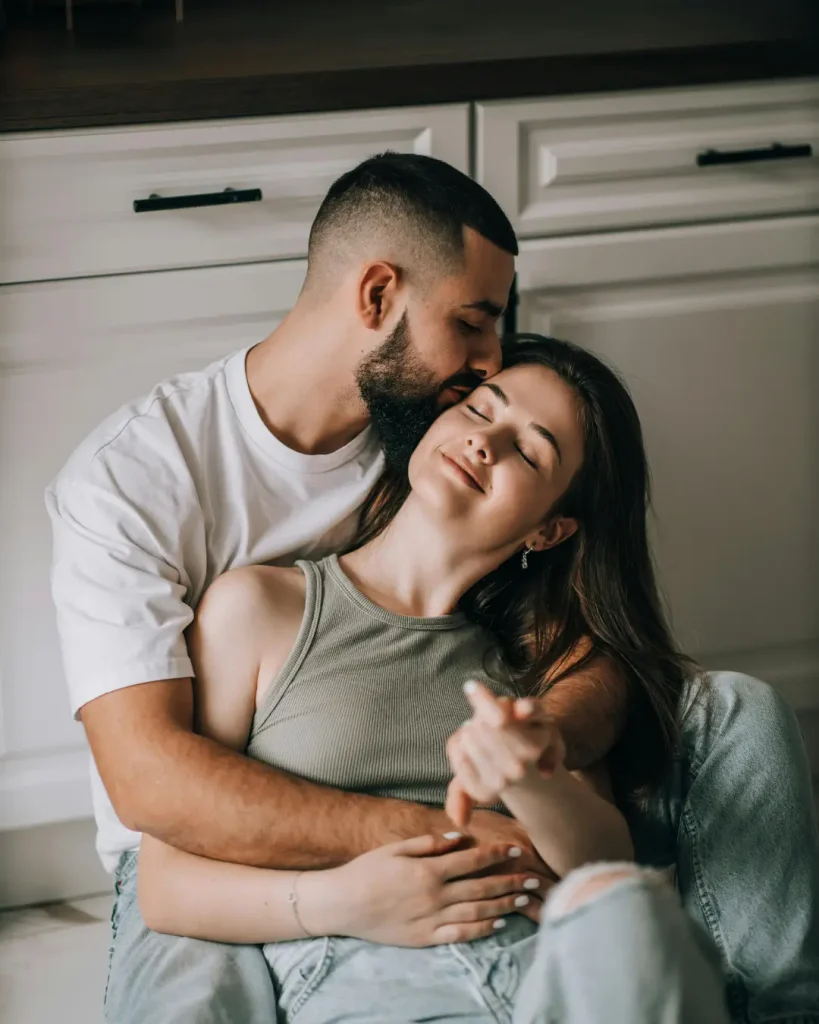 Romantic Couple Relaxing at Home in Kitchen
