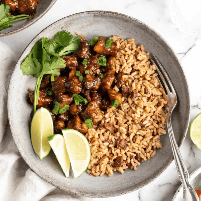 A bowl of Jamaican Jerk Tofu, with rice and salad