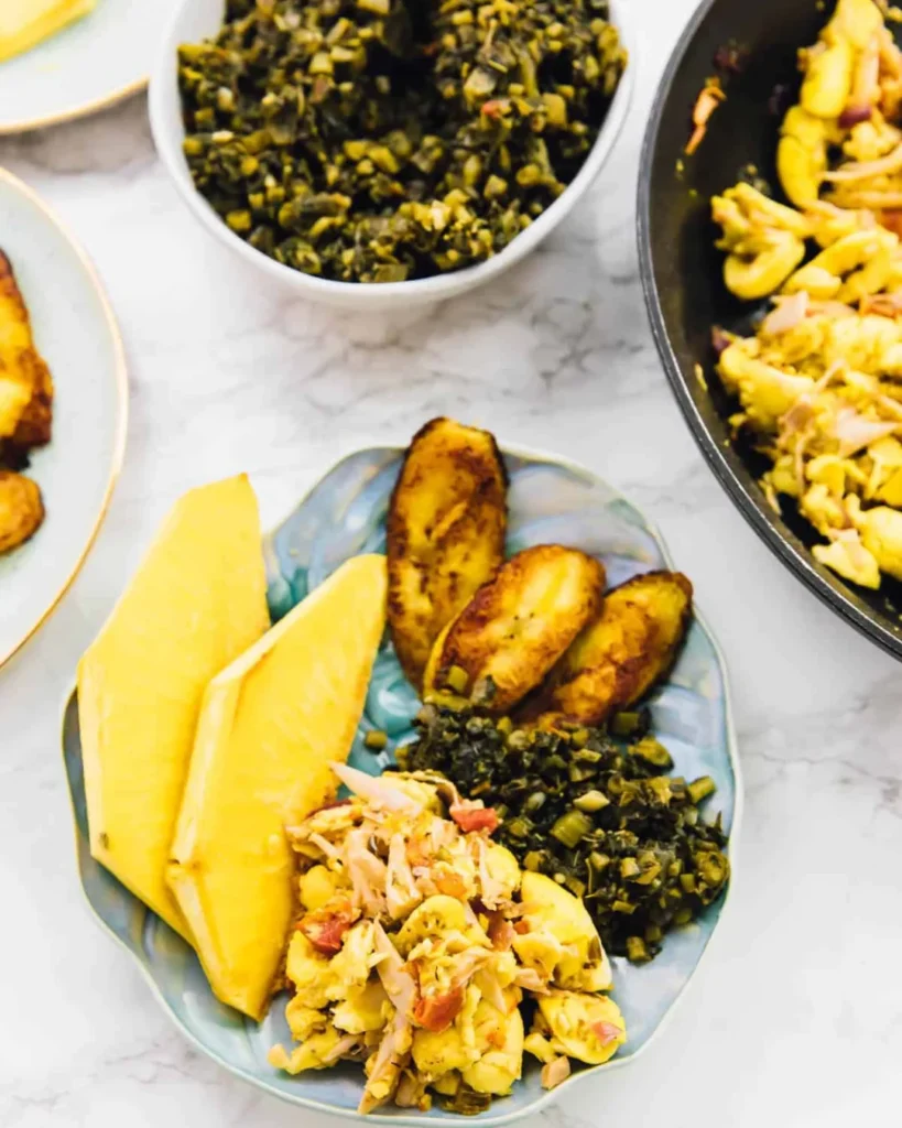 A plate consisting of ackee, plantain and callaloo