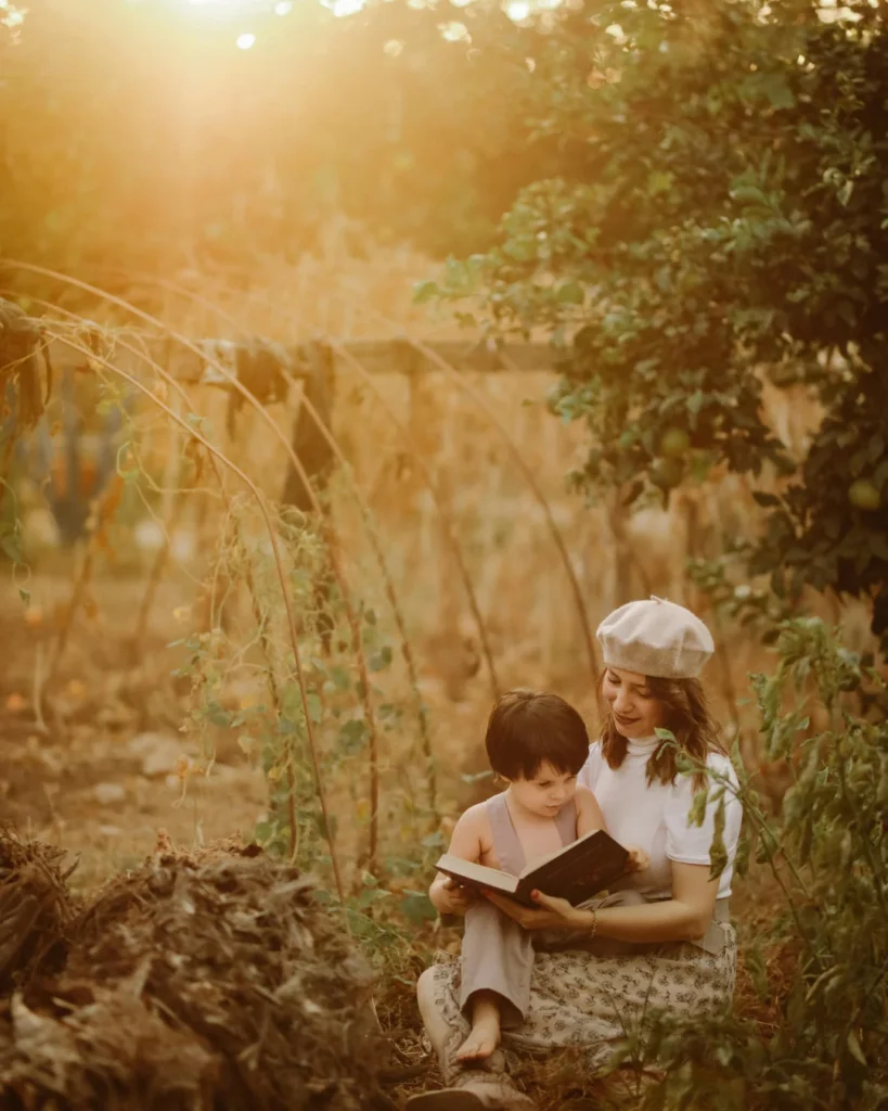 Mother and Child Reading Outdoors in Hatay Garden