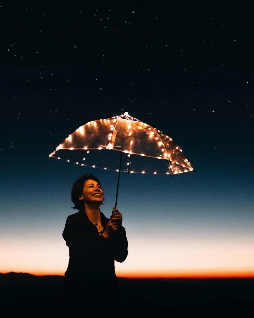 Woman Using Umbrella With Lights