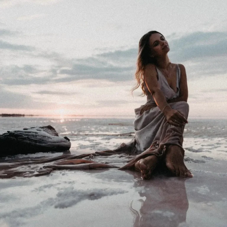 A Woman Sitting on the Seashore
