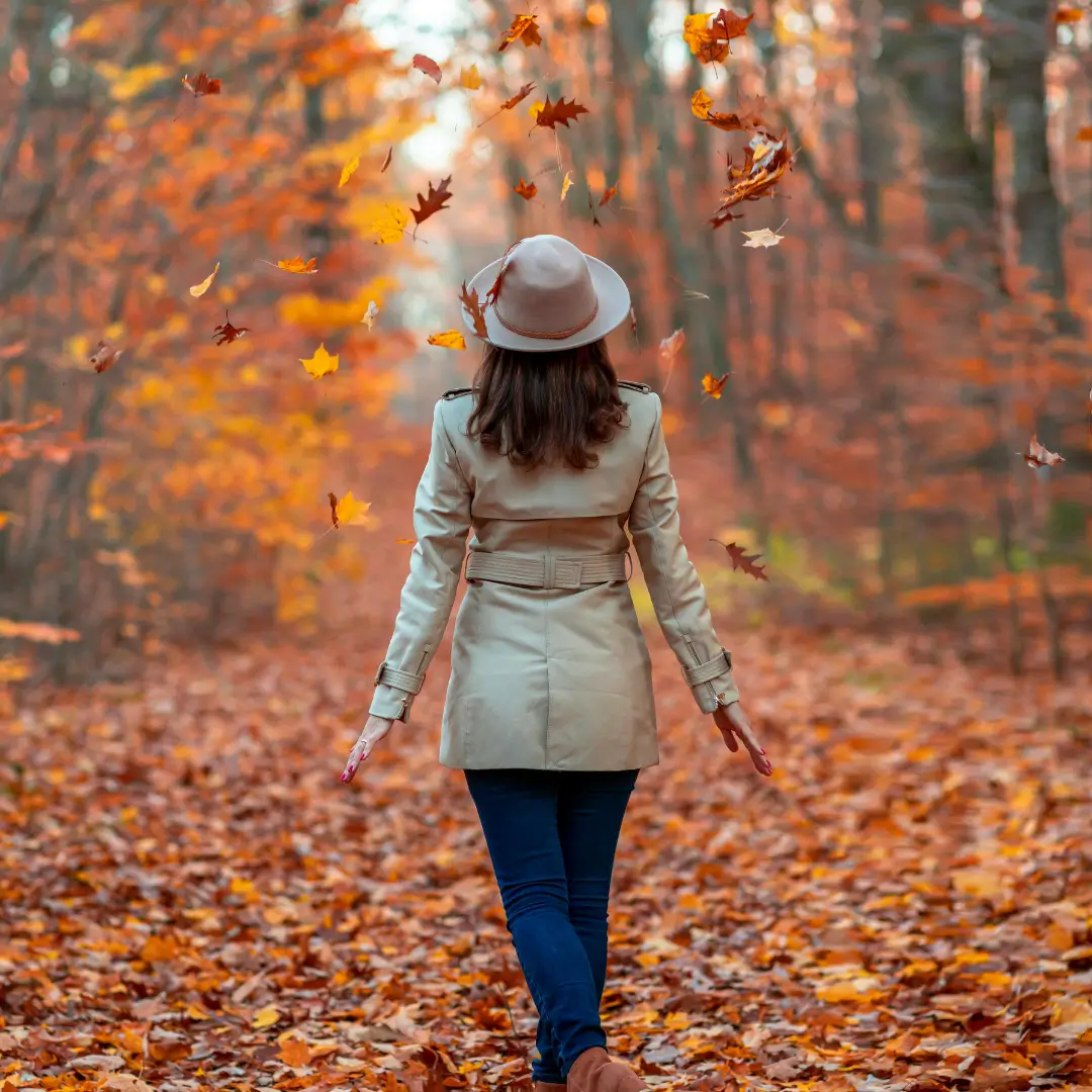 Woman in Hat Walking Autumn Park