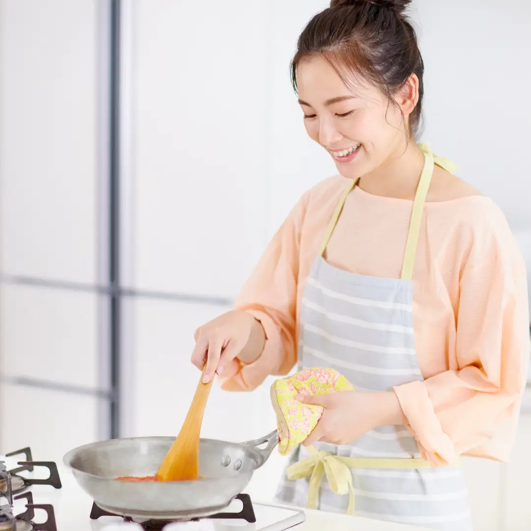 Woman Cooking in a Modern Kitchen