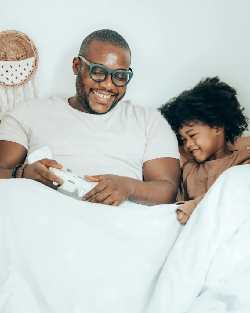 Happy Father Spends Time with Children