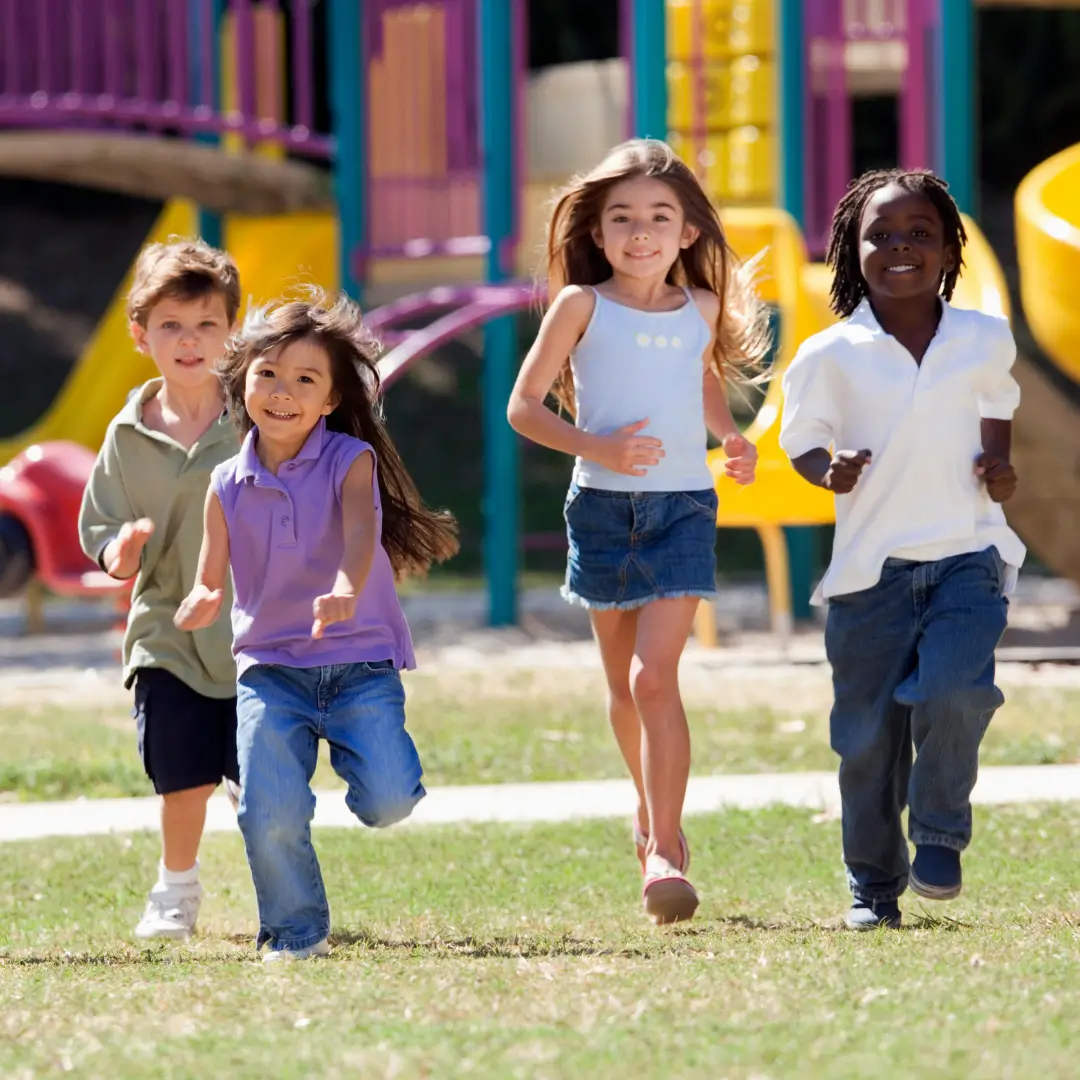 Kids Running on Grass Field