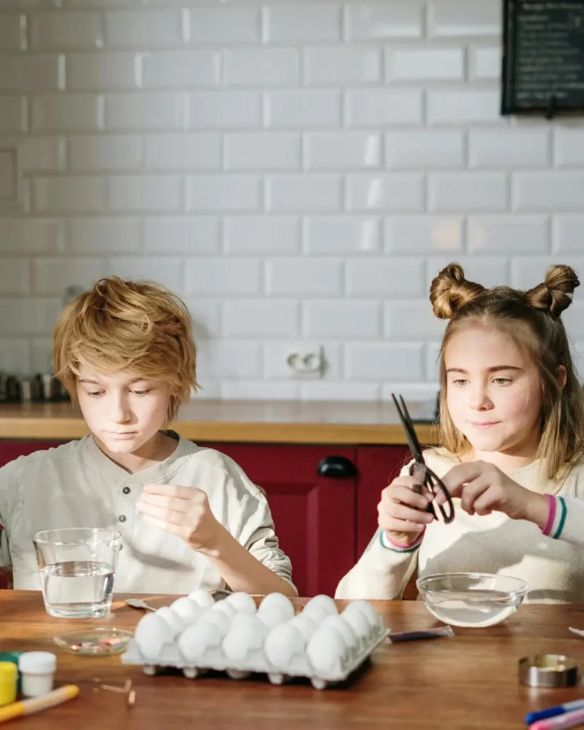 Siblings Doing DIY Easter Eggs