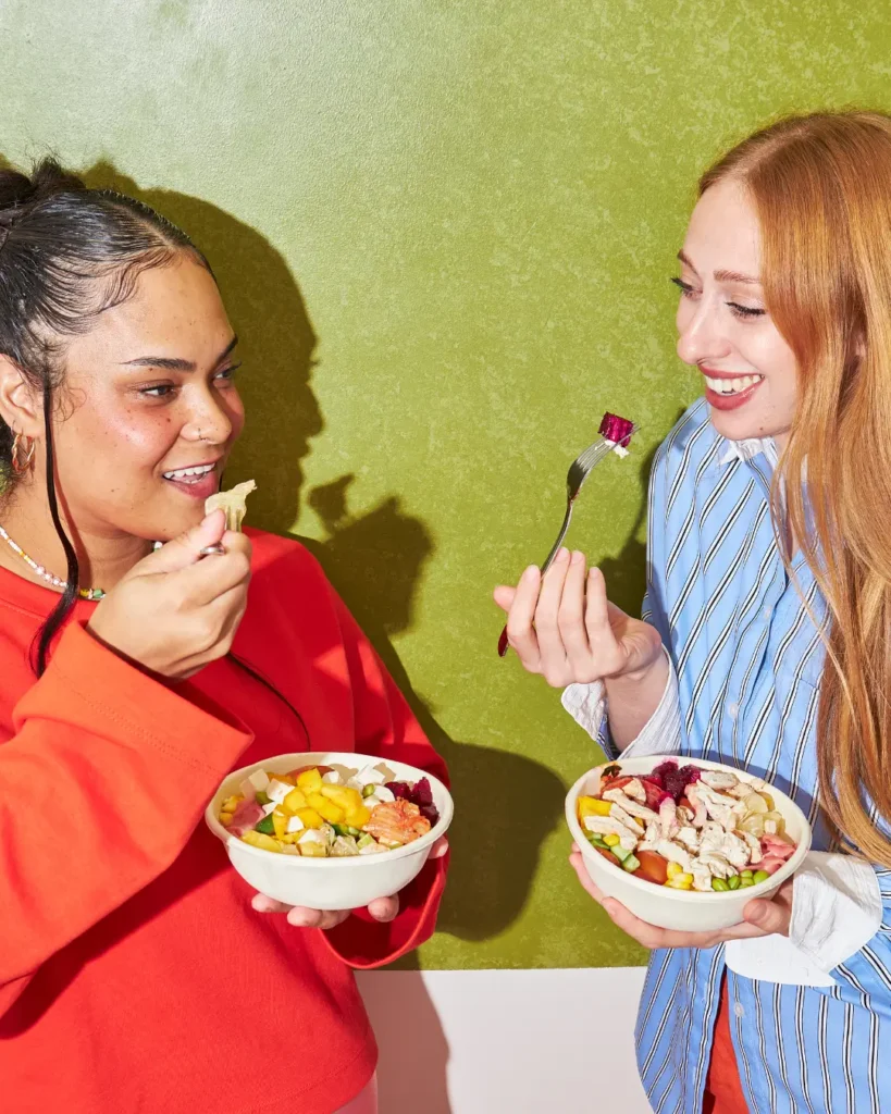 Two Women Enjoying Healthy Bowls