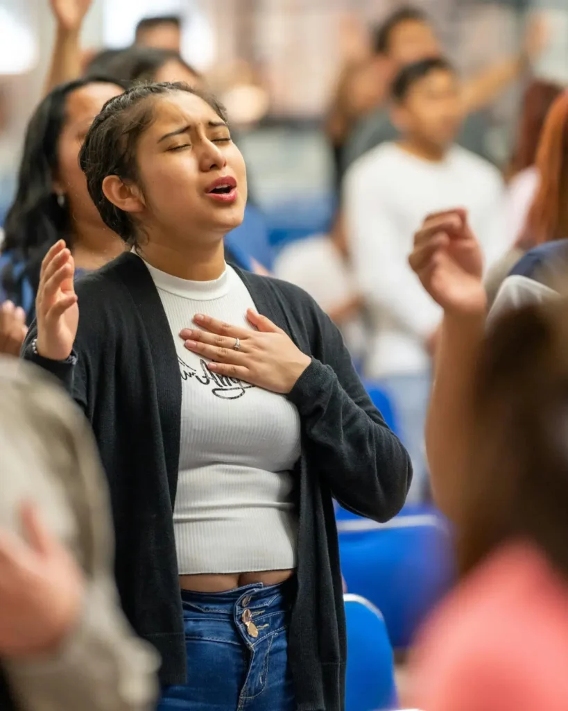 Woman Praying in a Church