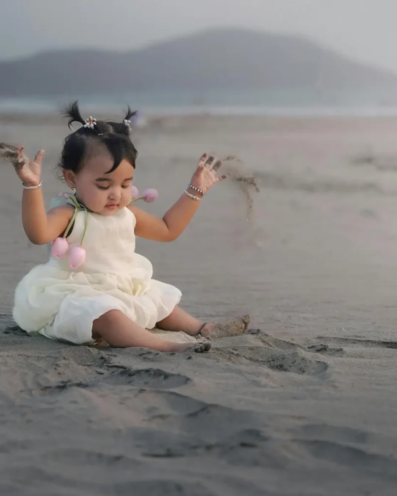 Adorable Baby Playing on Tranquil Beach