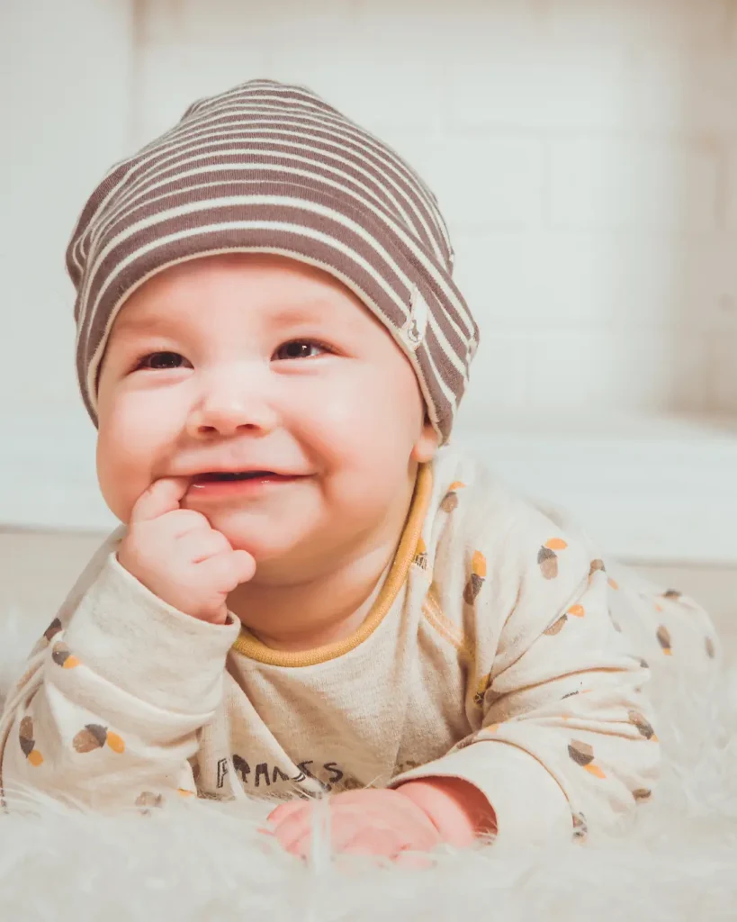 Newborn Smiling On The Ground