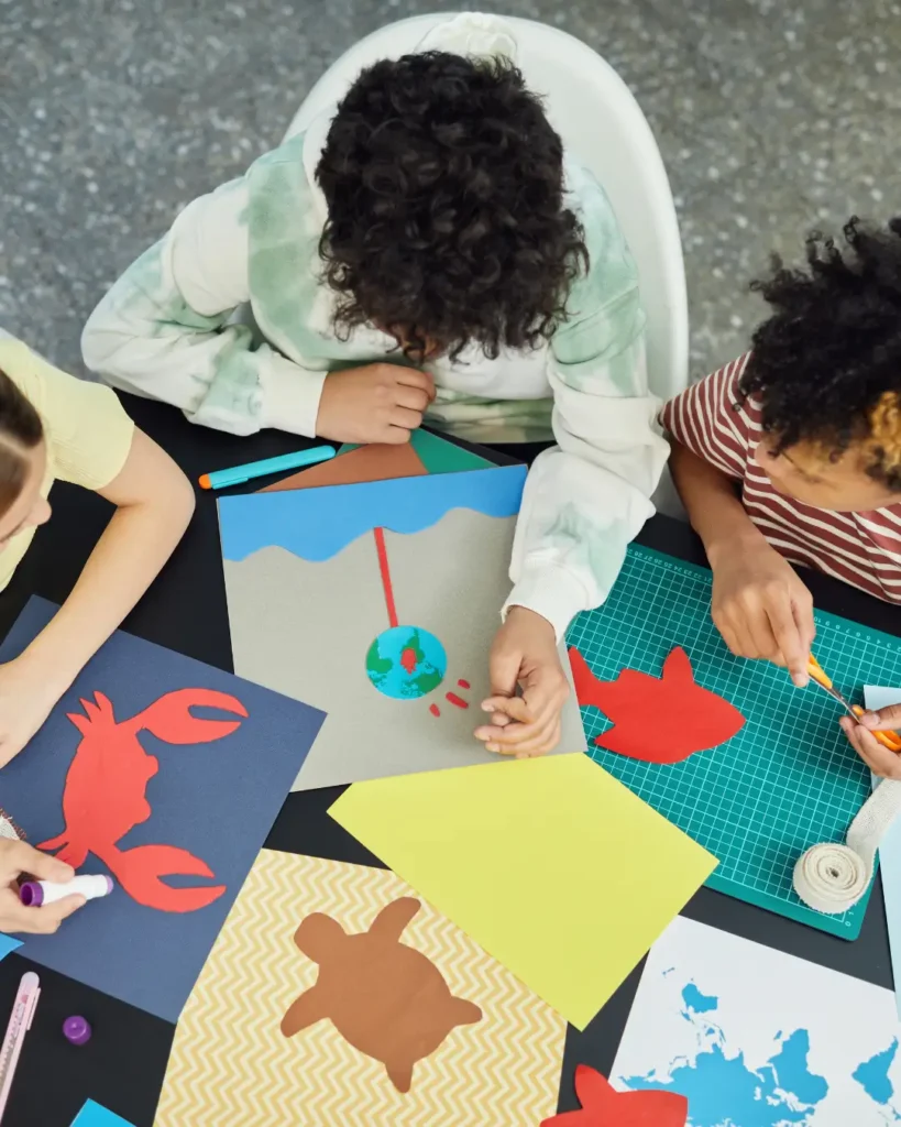 Group of diverse kids making drawings