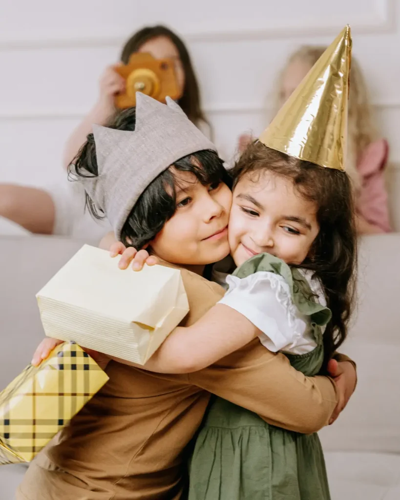 Kids Hugging in a Kids Party