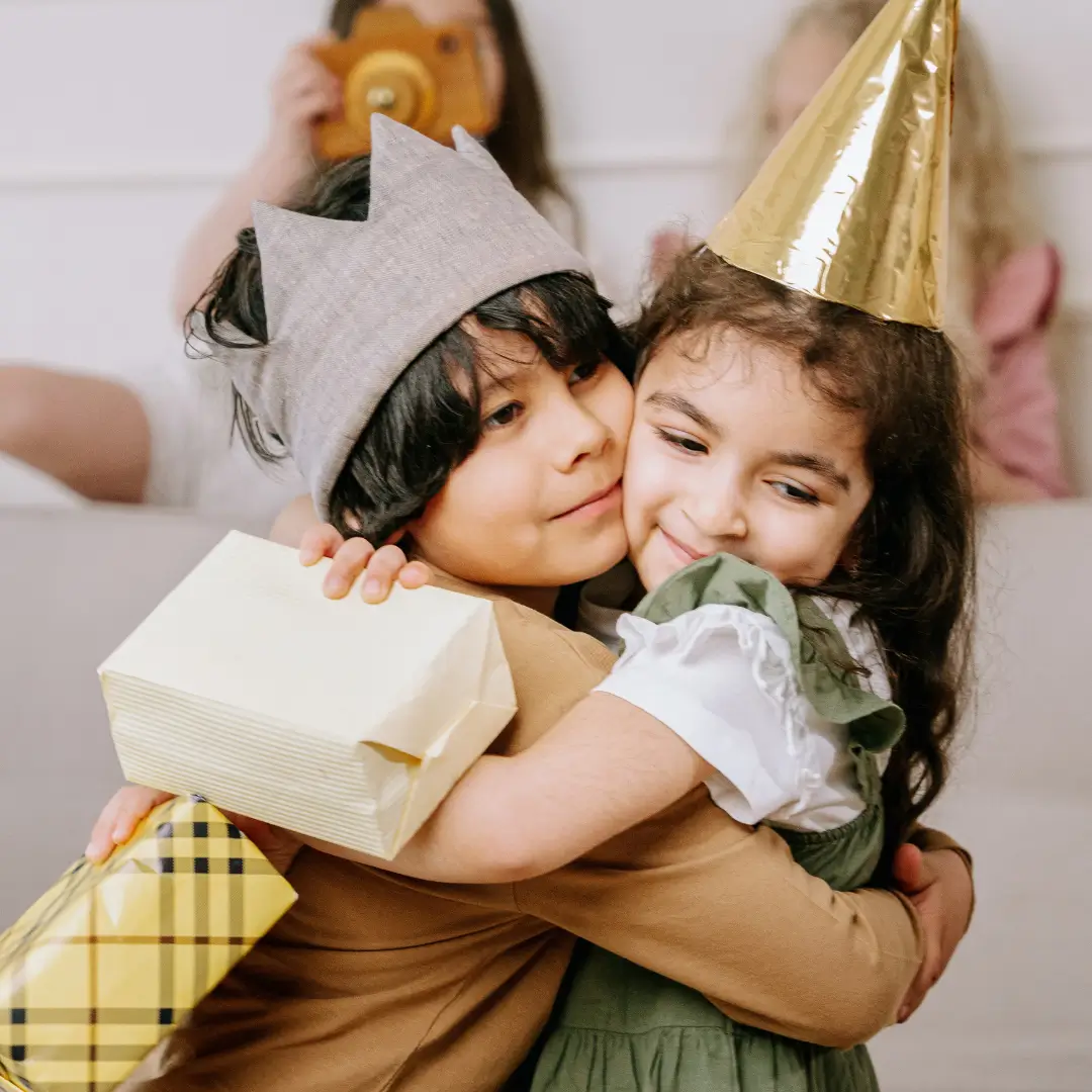 Kids Hugging in a Kids Party
