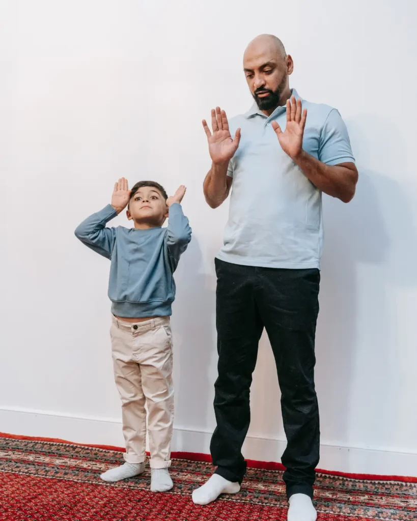 Little Boy Imitating Father Gesture