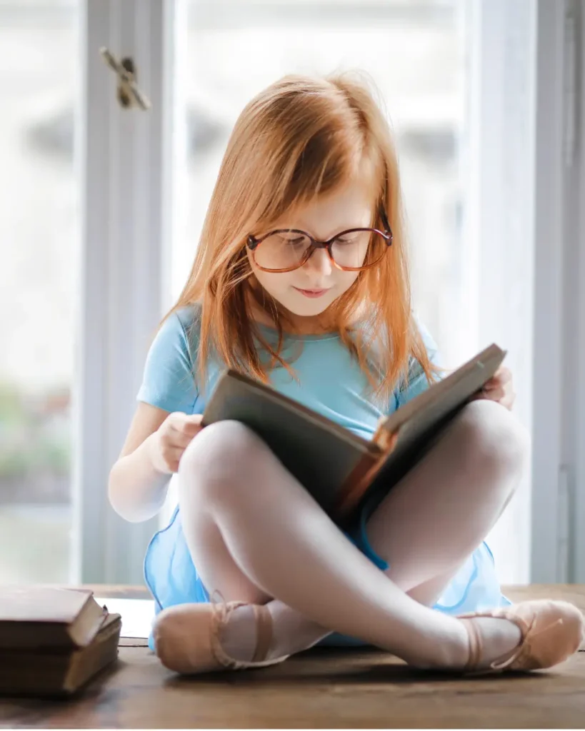 Photo Of Girl Reading Book