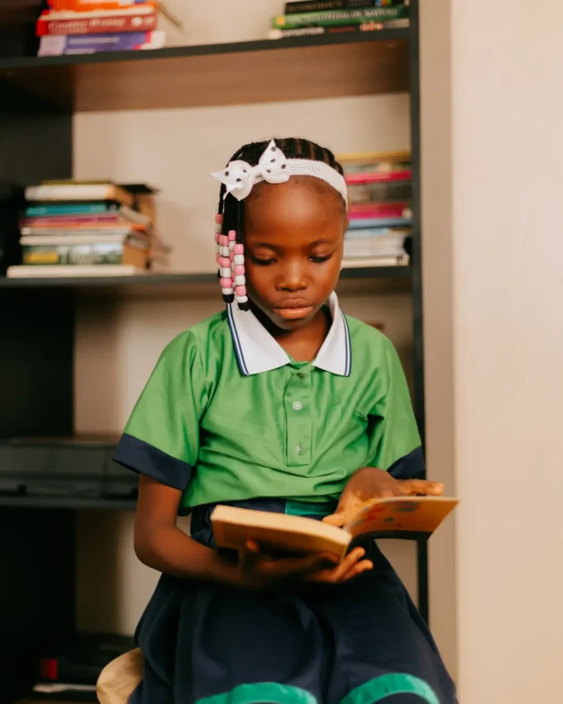 Young Girl Reading a Book