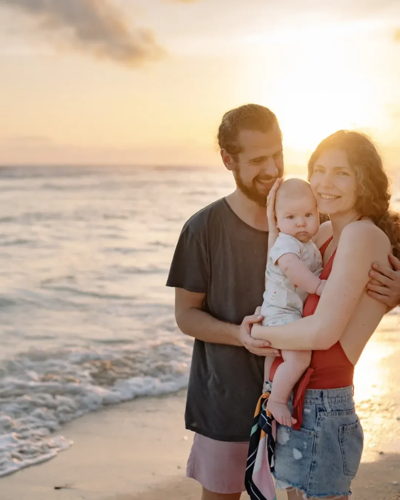 A Family Smiling at the Camera