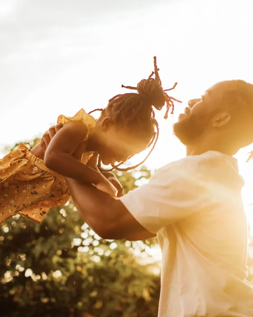 Father and Daughter Playing Outdoors