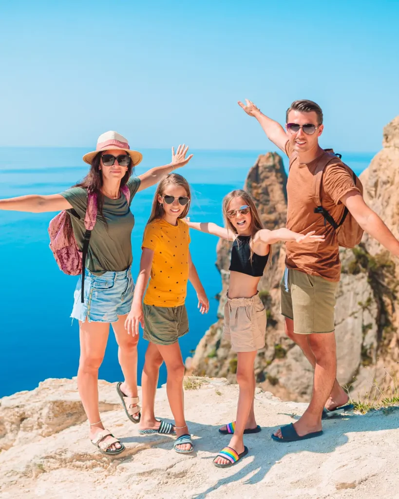 Happy Family on Vacation in the Mountains