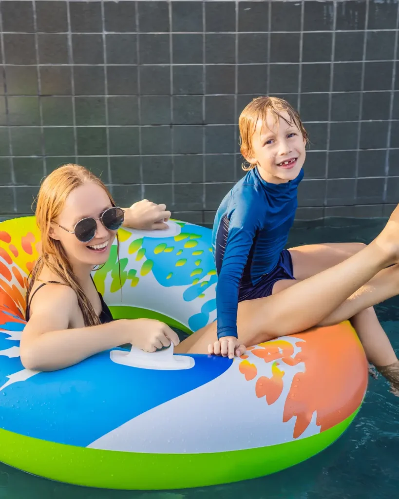 Mom and Son Having Fun at the Water Park