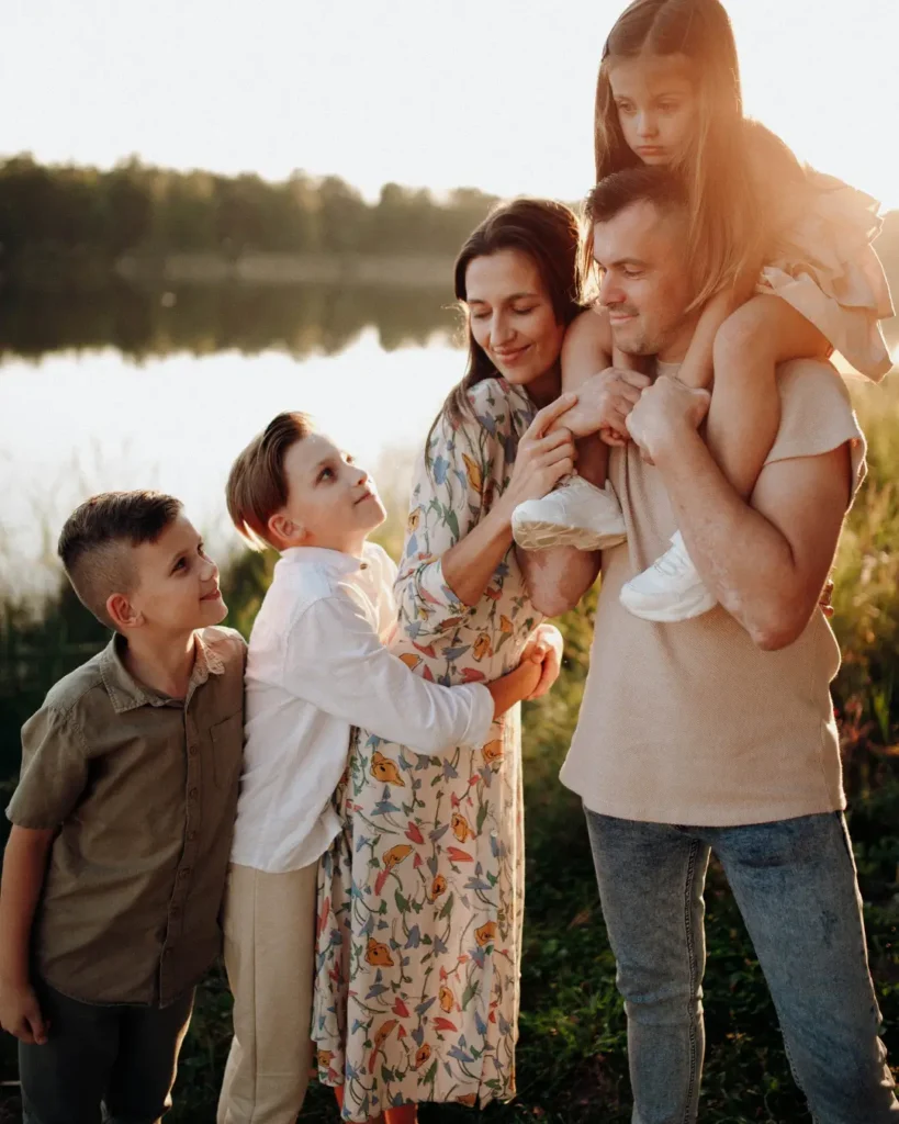 Smiling Family Sitting Together