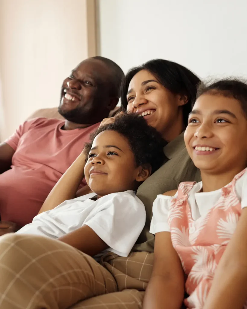 Happy Family Sitting on a Couch