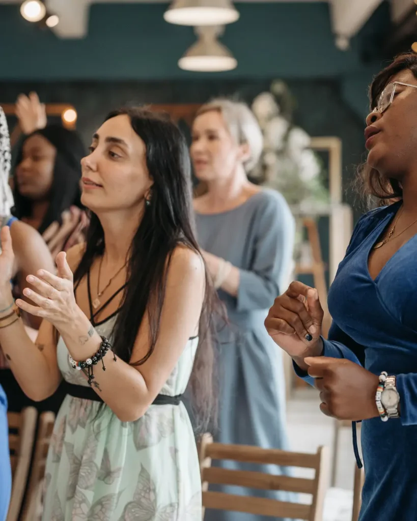 A Group of Women Singing Together