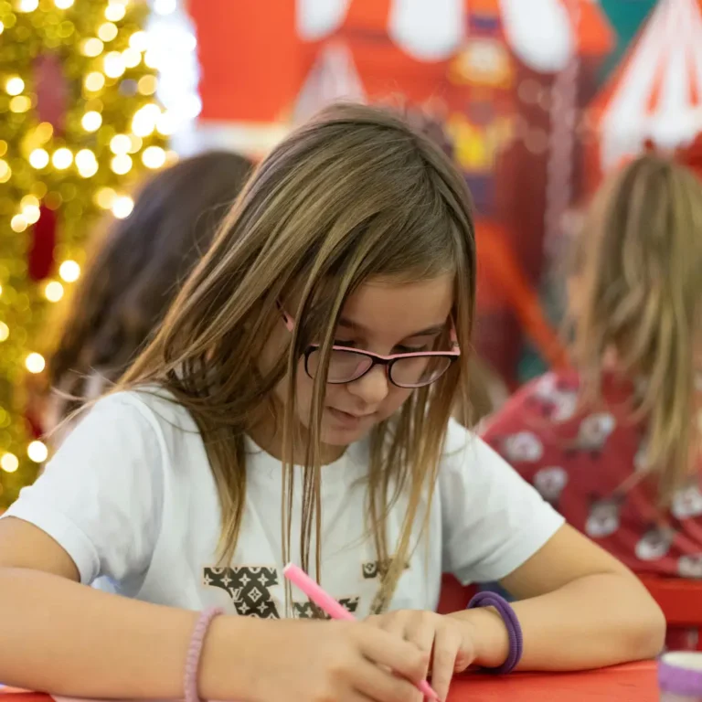 Girl Making Christmas Craft